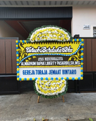 Papan Bunga Duka di Anak Petai